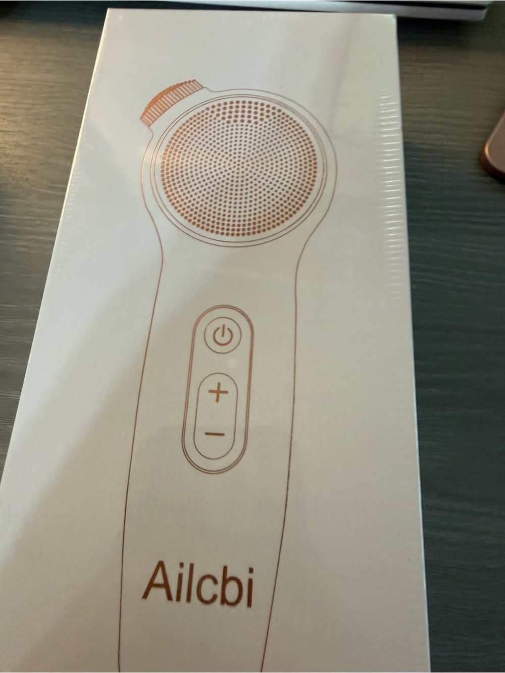 Ailcbi Facial Cleansing Device in White with Rose Gold Print